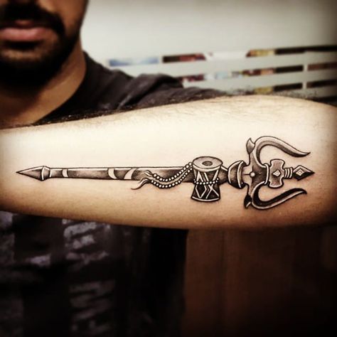 16 Divine Trident Tattoos Hindu Tattoos, Trident Tattoo, Trishul Tattoo Designs, Om Tattoo Design, Shiva Tattoo Design, Om Tattoo, Epic Tattoo, God Tattoos, Shiva Tattoo