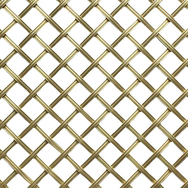 a close up view of a gold metal mesh fence with diamond shaped squares on it