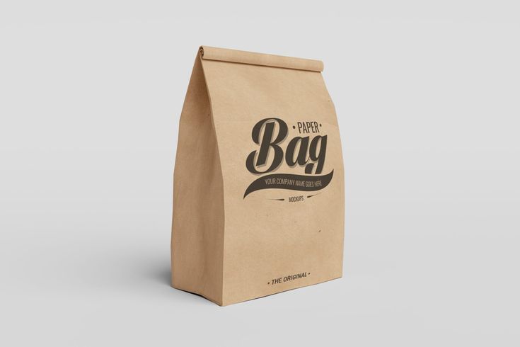 a brown paper bag mockup on a white background with the text free psd