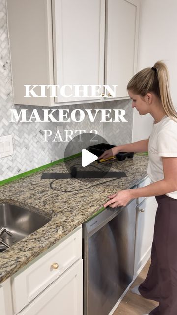 a woman is cleaning the kitchen counter top with a sponge and a rag in front of her