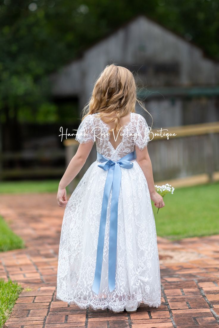 FLOWER GIRL DRESSES 10% OFF - DISCOUNTED IN CART 😍 PLUS FREE SHIPPING ON ALL ORDERS $100 UP The perfect fairytale wedding flower girl dress. This pretty whimsical style White Lace Flower Girl dress features a soft stretch lace bodice and a feathered lace V-back with a full length tulle skirt. Dress is lined and perfect for your flower girl dress, communion dress, baptism dress, birthday dress or special occasion. Beautiful for photoshoots and portraits The perfect flower girl dresses for bohemi Flowers Girl Dresses, Vintage Flower Girl Dresses, Flower Girl Dresses White, Flower Girl Dresses Lace, Full Length Tulle Skirt, Blue Flower Girl Dress, Yellow Flower Girl Dresses, Bohemian Flower Girl Dress, Flower Girl Dress White