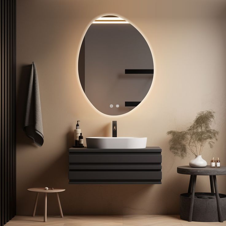 a bathroom with a round mirror above the sink and lights on the wall behind it