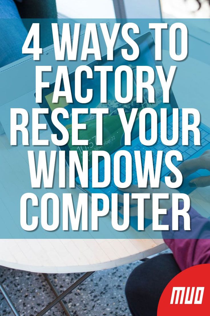 a woman sitting at a table using a laptop computer with the words 4 ways to factory reset your windows computer