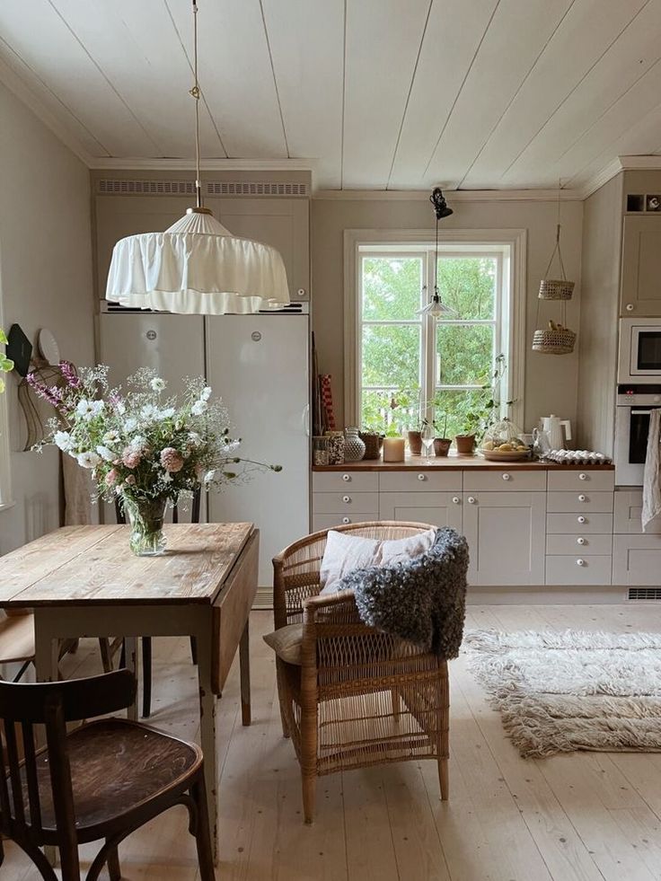 the kitchen is clean and ready to be used as a dining room or living room