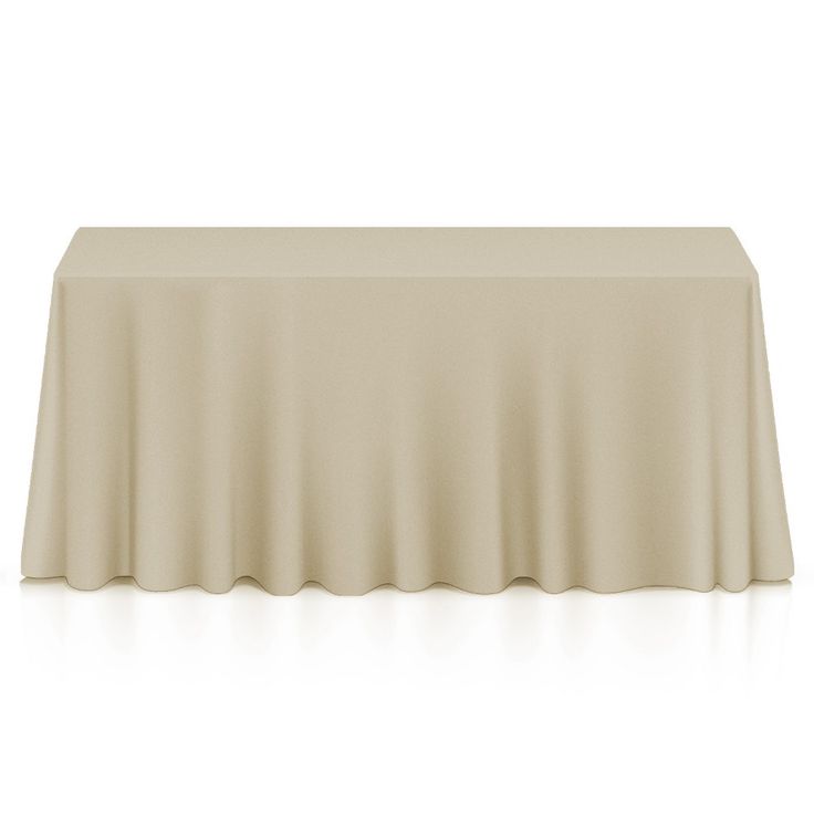 an empty table with a white cloth on it and the top half covered by a plain sheet