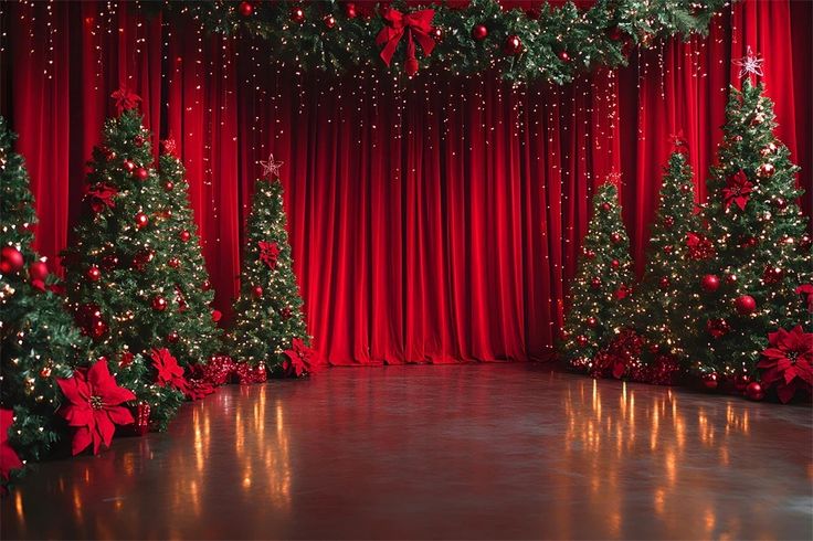 a stage with red curtains and christmas trees