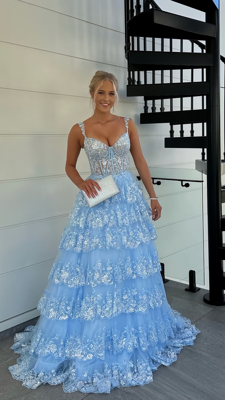 Be the belle of the ball in our Off The Shoulder Lace Sequin Prom Dress! This dress features delicate lace and sparkling sequin details that will make you stand out. The ruffle skirt adds a touch of elegance, making it the perfect choice for prom or any special occasion. Feel beautiful and confident with this dress that will surely turn heads. Dress DetailStyle: A-lineFabric: Lace, SequinColor: Black, BlueLength: Floor Length with Sweep TrainNeckline: SweetheartSleeves: Spaghetti StrapBack Style: Lace up back Long Black Hoco Dress, Homecoming Dresses For Teens, Prom Inspo, Floral Prom Dresses, Hoco Dress, Homecoming Dresses Tight, Sequin Prom Dress, Prom Dresses Two Piece, Dresses Tight