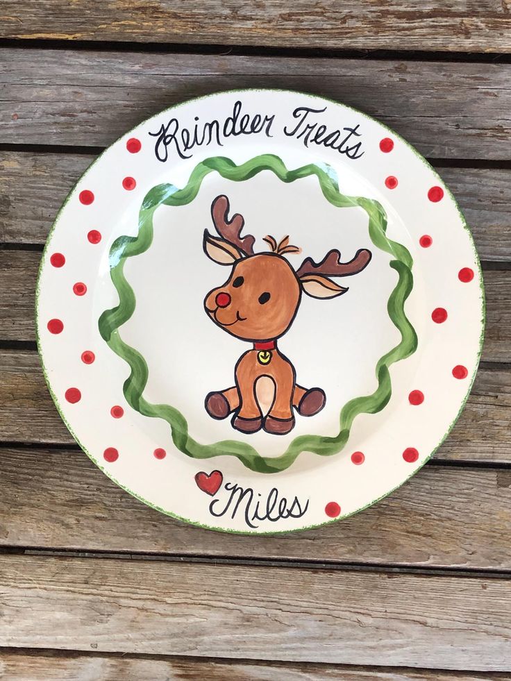 a plate with a reindeer painted on it that says,'reindeer treats miss '