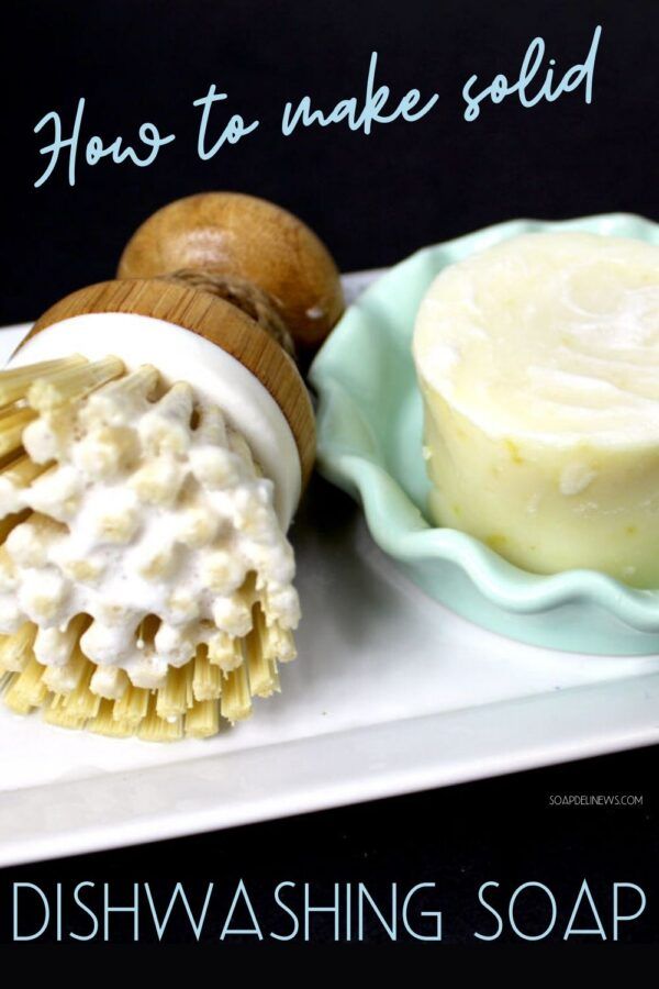 dishwashing soap on a tray with two pieces of bread and an acorn