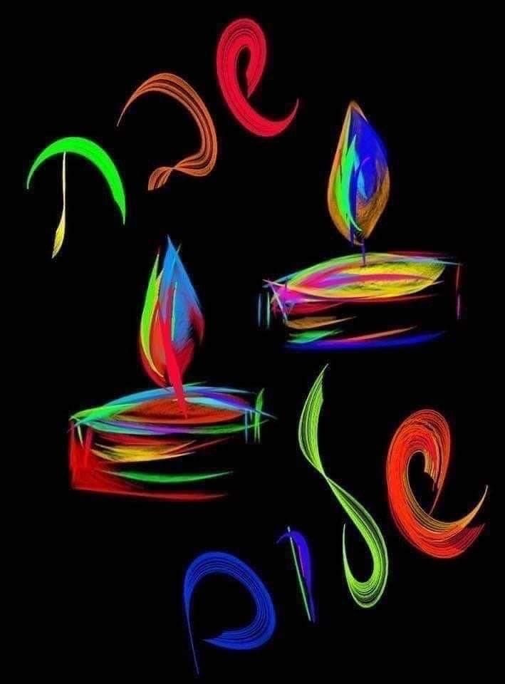 some colorful candles are lit on a black background with swirls and shapes around them