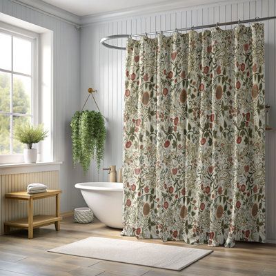 a bath room with a tub and a shower curtain