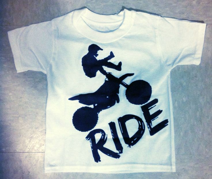 a t - shirt that says ride with a silhouette of a person riding a motorcycle