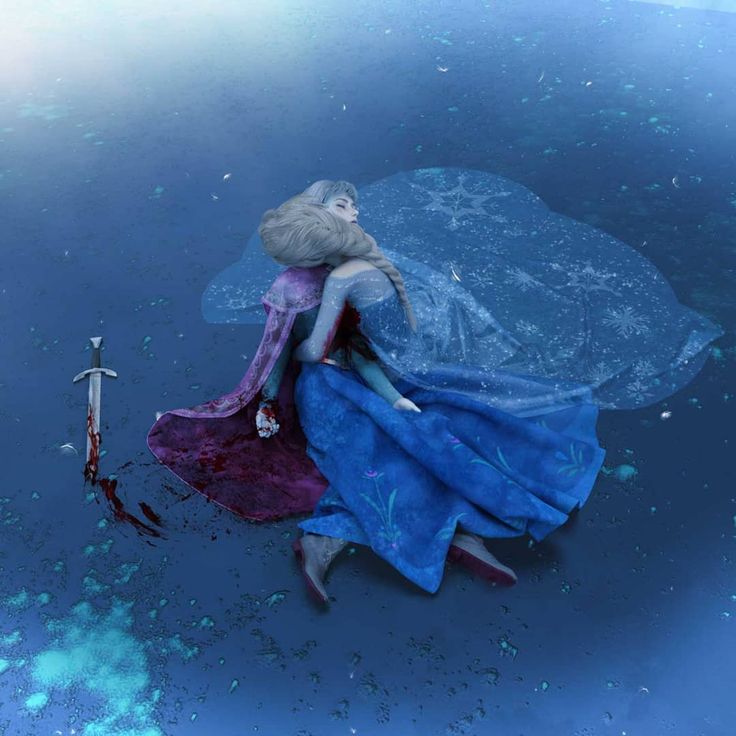 a woman in a blue dress is walking through the water