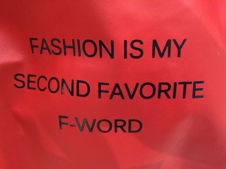 a red bag with black writing on it that says fashion is my second favorite f - word