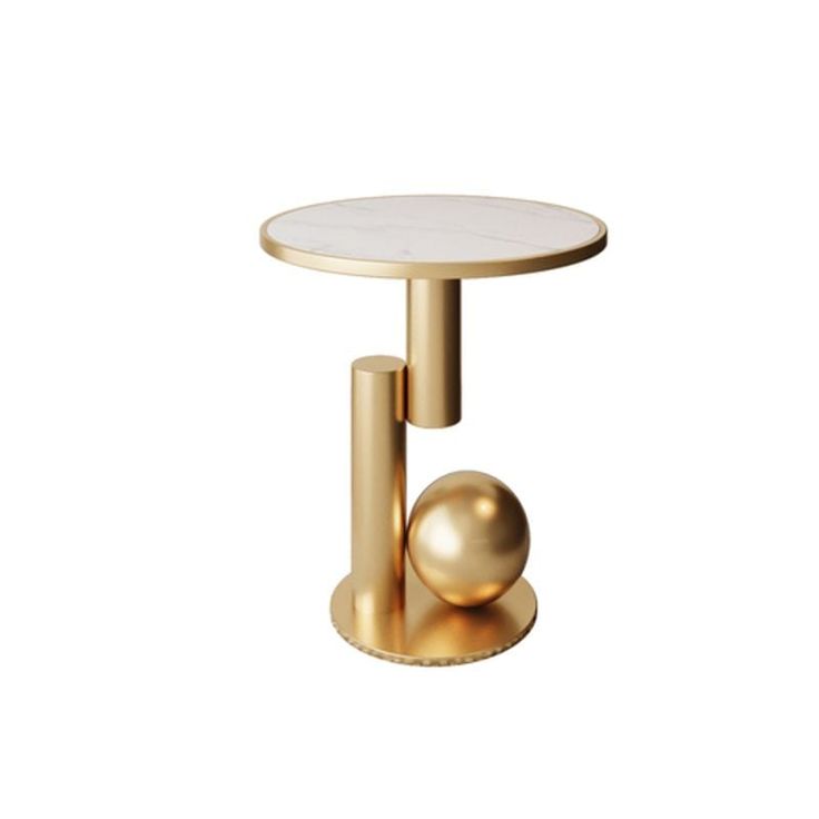 a gold table with a marble top and two balls on the base, against a white background