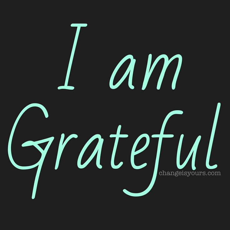 the words i am grateful written in green ink on a black background with white lettering