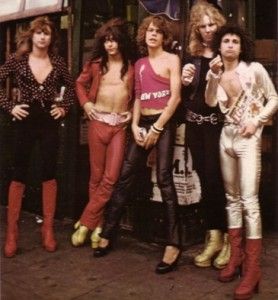 the group of women are posing in front of a store