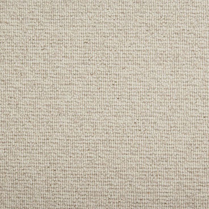 the texture of an upholstered beige fabric