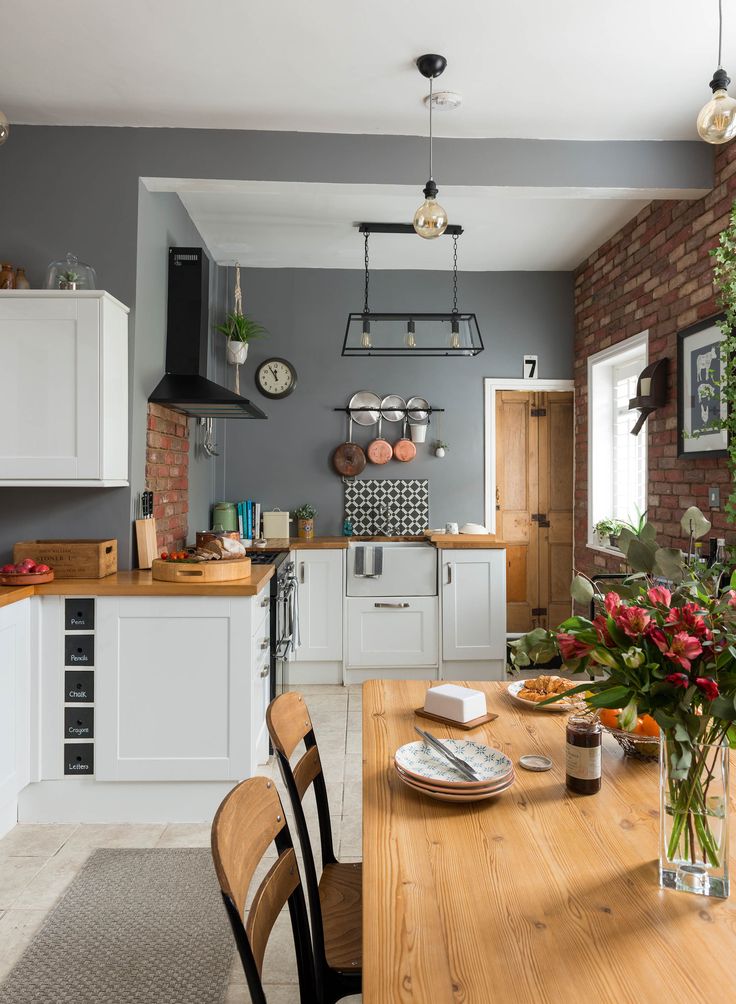 the kitchen is clean and ready to be used as a dining room or living room