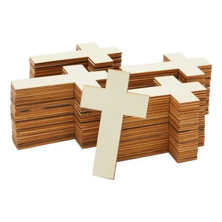 wooden crosses are stacked on top of each other in the shape of a puzzle box