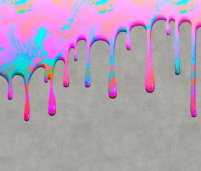 multicolored dripping paint on a gray background