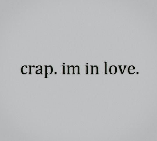 the word crap im in love written on a wall