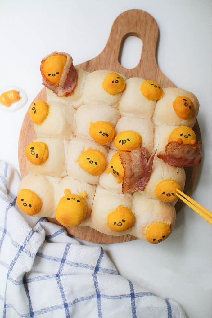 some kind of food that is on a cutting board with chopsticks in it