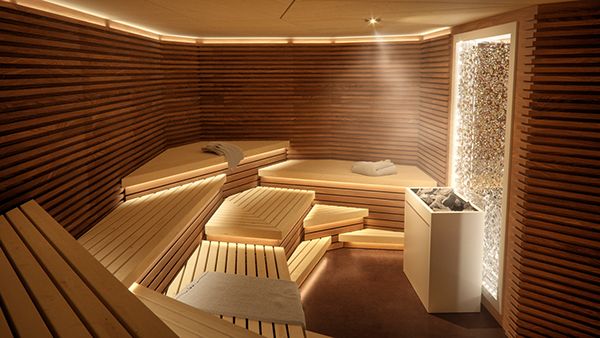 a sauna room with wooden walls and benches