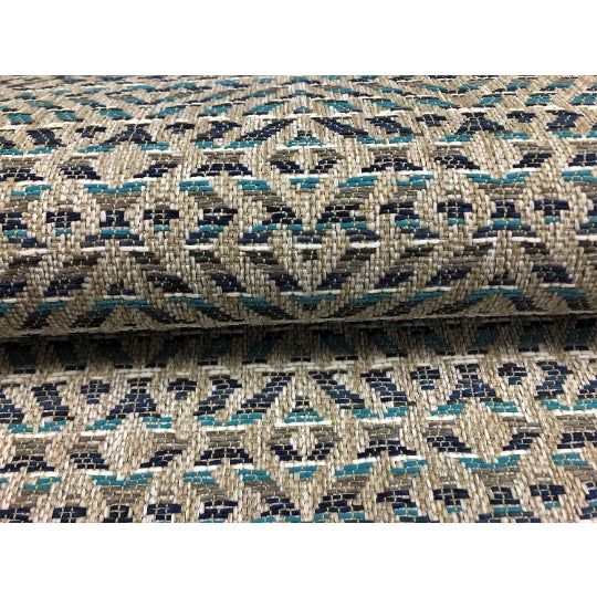 two pieces of fabric with blue and beige designs