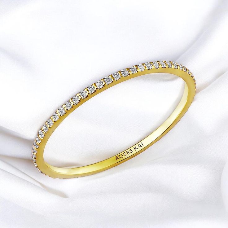 💎 14K Solid Gold Dainty Diamond Eternity Band, Anniversary Eternity Ring *Metal: 14K Solid Gold (Yellow, White, or Rose) *Diamonds:      - Cut: Round     - Clarity: VS     - Size: 1 mm      - Total Carat Weight (CTW): 0.2     - Ring Size: Available in various sizes, custom sizes upon request Perfect For: Anniversary Gifts Wedding Bands Milestone Celebrations A Gift of Eternal Love Unveil the enchanting allure of eternal love with the Kai Real 14K Gold Natural Diamond Eternity Band. Exclusively Oval Wedding Band, Diamond Eternity Band, Unique Wedding Bands, Ring Metal, Diamond Wedding Band, Eternity Band Diamond, Diamond Eternity, Gifts Wedding, Eternity Band