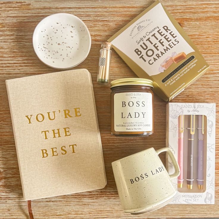 the contents of a woman's personal care kit laid out on a wooden table