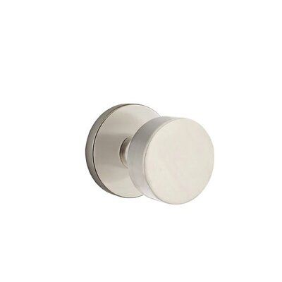 an image of a door knob with two round knobs on the front and side