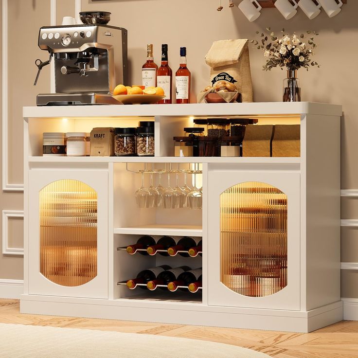 a white cabinet filled with bottles and glasses