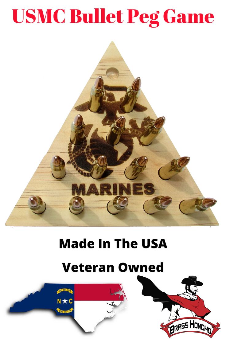 a wooden triangle with the words made in the usa and an image of marines on it