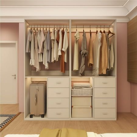 a closet with clothes and suitcases hanging on the wall, next to a bed