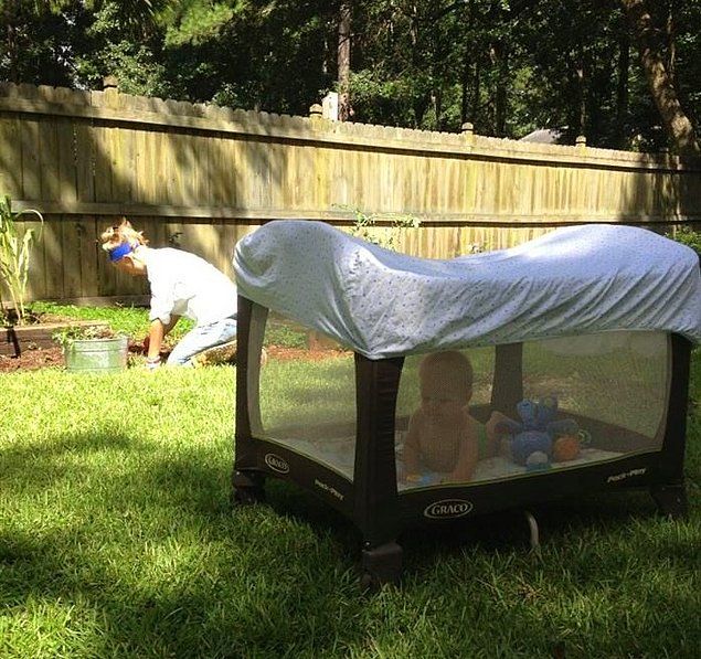 a baby in a crib with a cover over it and the words tips - n - tricks slip a fitted sheet over a pack & play to keep the bugs off the baby and provide shade while outside