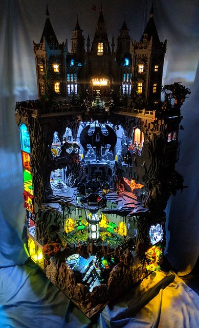 an elaborate display case is lit up in the dark