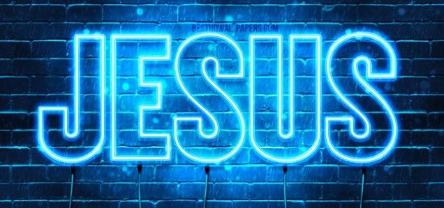 the word jesus is illuminated in blue neon lights against a brick wall with a spotlight