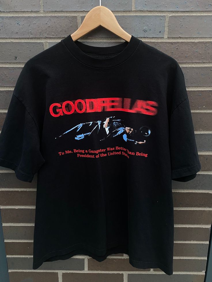 "Vintage 1990 Goodfellas Movie Promo Vintage Shirt  - Missing Tag - Fits like Large (Length 27\", Chest 22\") - Overall great vintage condition (no holes/ no stains) - Message for more information Please take note of the measurements listed as these are vintage clothes and may fit different than the tag size. Follow our page for more vintage clothing drops!" Vintage Movie T Shirts, Famous T Shirt Design, Movie Graphic Tees, Movie Tshirt Designs, Mens Vintage Tees, Graphic Vintage Tees, Vintage Shirt Designs Graphic Tees, Graphic Tshirt Design Prints Vintage, Vintage Tshirt Design Graphics