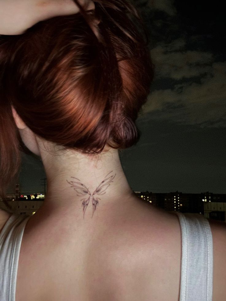 #tattoo #butterfly #tattooideas #tattooart #butterflytattoo #meaning #ideas #pins #instagram #daily #fashion #style #back #neck #pain #city #night Back Neck Tattoo Butterfly, Tattoo Neck Butterfly, Butterfly Behind Neck, Hidden Neck Tattoo, Neck To Back Tattoos Women, Back If Neck Tattoos Women, Aesthetic Neck Tattoo, Tiny Neck Tattoo, Butterfly Tattoo Back Of Neck