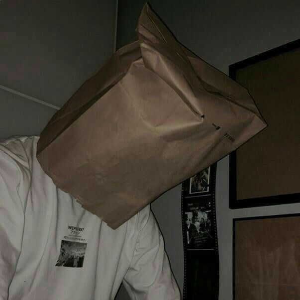 a man with a bag on his head