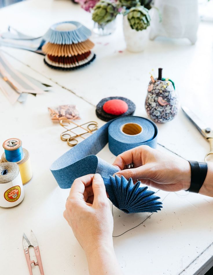 a person is working on some crafting supplies