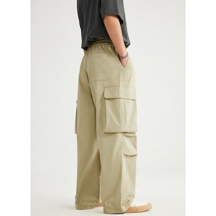 Spring/Summer Big Pocket Parachute Wide Leg Cargo Pants Fabric: 100% Polyester Size: S, M, L, XL Multiple Color Selections: Khaki  Season: Spring, Fall, Summer Khaki Bottoms For Leisure In Summer, Khaki Bottoms For Summer Leisure, Summer Cargo Pants With Elastic Waistband For Outdoor, Khaki Summer Outdoor Pants, Wide Leg Parachute Pants For Summer Outdoor Activities, Summer Wide-leg Parachute Pants With Pockets, Summer Wide Leg Parachute Pants For Outdoor, Summer Outdoor Wide Leg Parachute Pants, Summer Outdoor Cargo Pants With Pockets