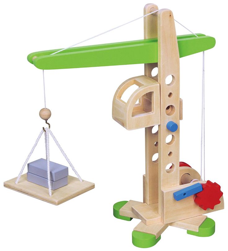 a wooden toy with a green top and white base holding a piece of wood in the shape of a crane