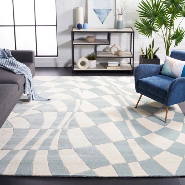 a blue and white rug in a living room