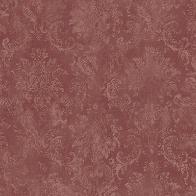 a red wallpaper with an ornate design