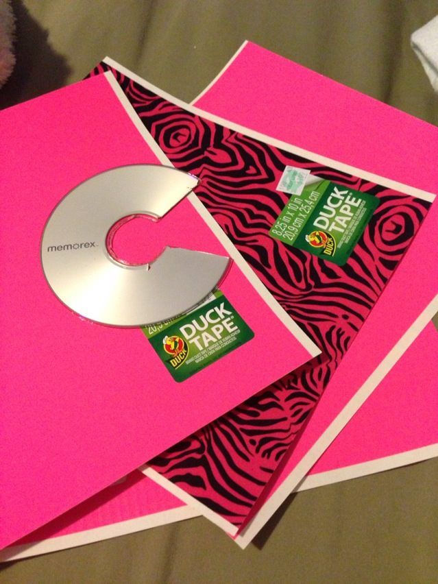 pink folders with cd inside and zebra print on them