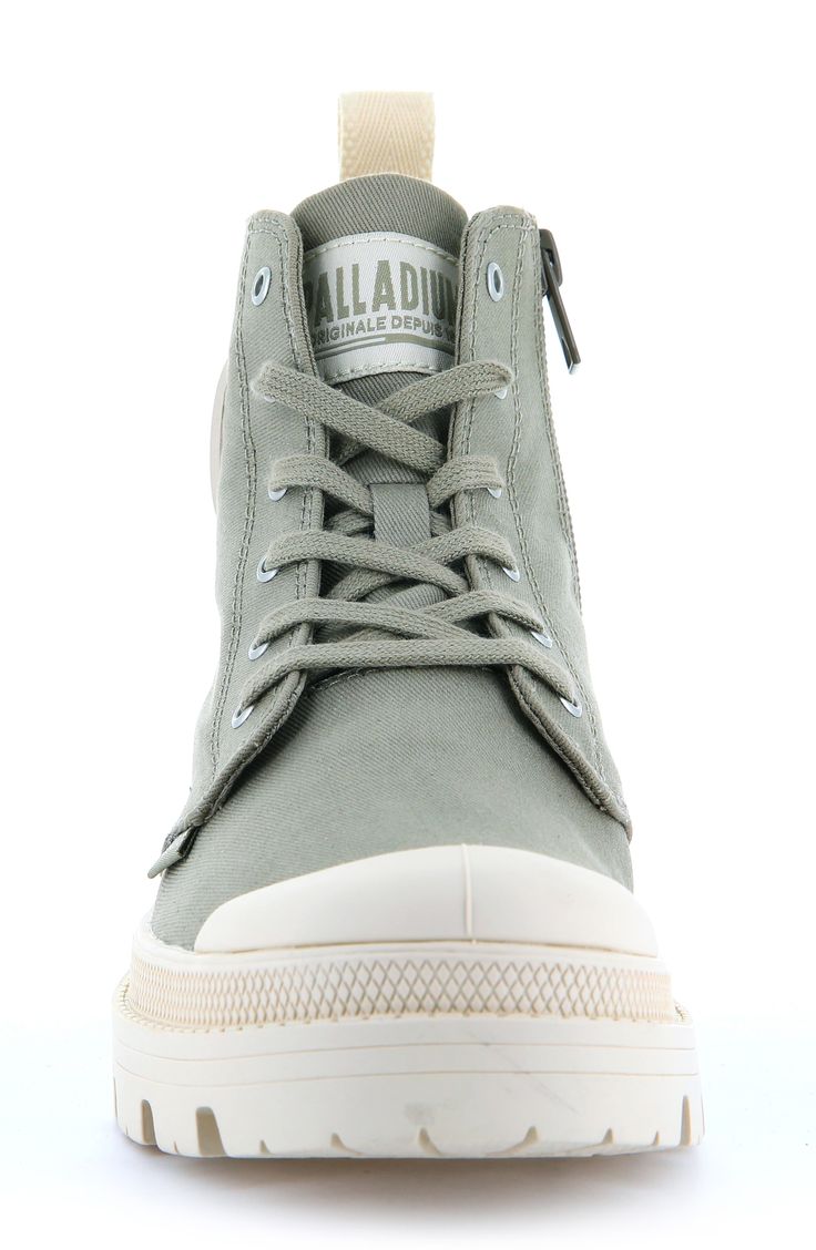 A tonal logo patch accentuates the sporty style of a high-top–inspired bootie set on a sturdy lugged sole. 2" heel; 1" platform; 4" shaft (size 8.5) Lace-up style; inside zip closure Textile upper and lining/rubber sole Imported Women's Shoes Sporty Style, Up Styles, High Top, Bootie, Patch Logo, Women's Shoes, High Tops, Rubber Sole, Personal Style