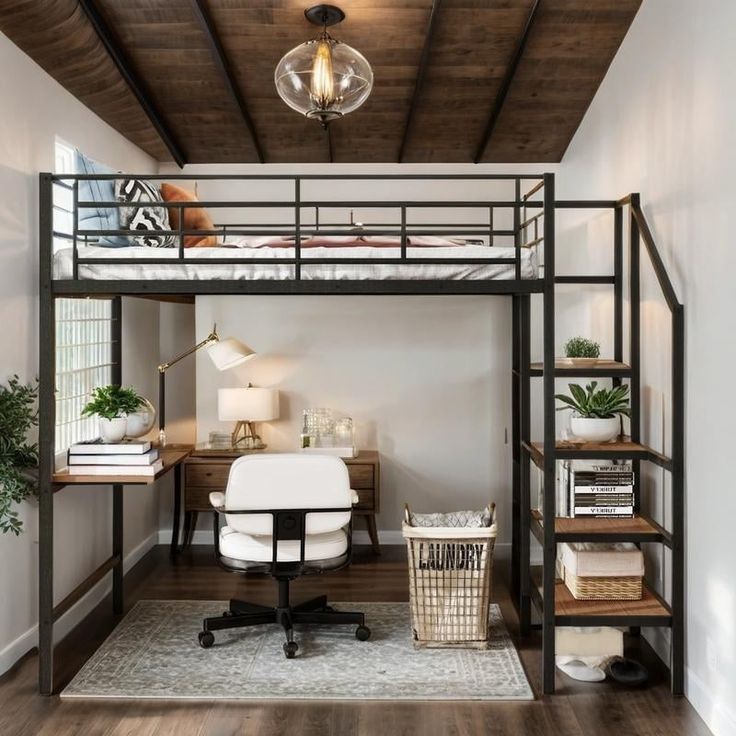 a loft bed with desk underneath it in a room that has hardwood floors and white walls