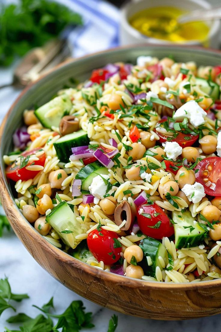 a salad in a wooden bowl on a table